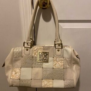 Sharif cream faux leather purse with gold studs/pattern squares.